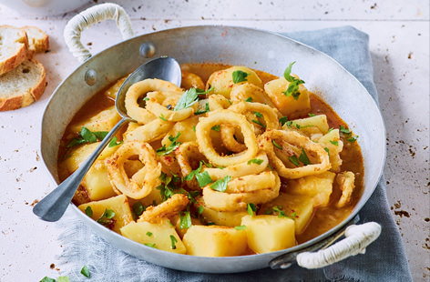 Smoked paprika adds a wonderful depth to this rich Spanish stew. Whipped up in just 30 minutes and filled with potato cubes and tender squid rings, this makes a great weeknight recipe. 